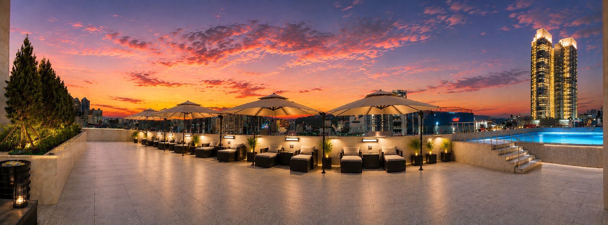 Seasonal outdoor pool, open 5:00 PM to 8:00 PM, pool umbrellas