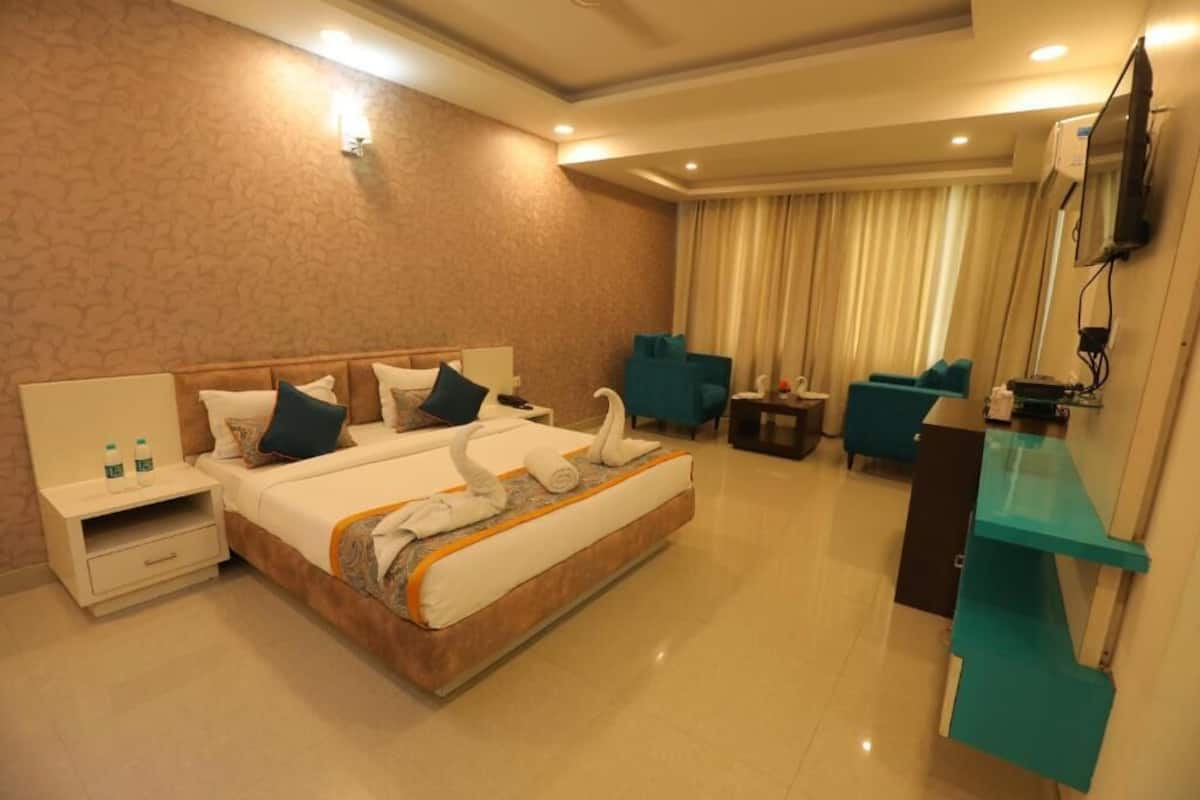 Standard Double Room, Balcony, City View( Unmarried couples not allowed) | In-room safe, desk, laptop workspace, blackout drapes