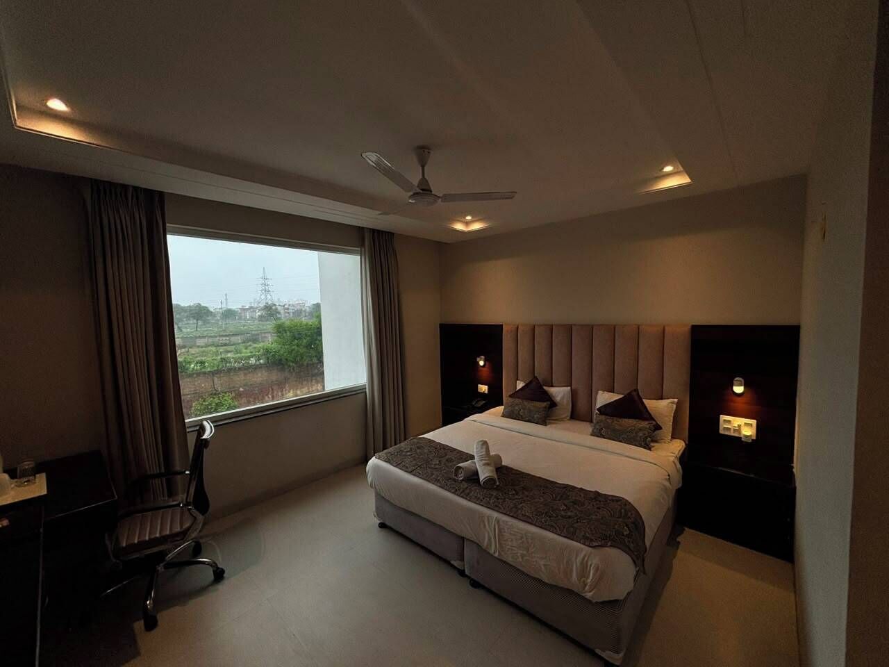 Premium Double Room, Balcony, Garden View | In-room safe, desk, laptop workspace, blackout drapes
