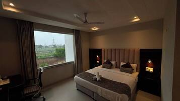 Premium Double Room, Balcony, Garden View | In-room safe, desk, laptop workspace, blackout drapes