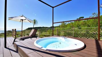 Apartment, Sea View | Outdoor spa tub