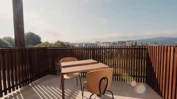 Superior Room, Balcony, Pool View | Outdoor dining