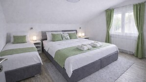 A hotel room with a large bed, two bedside tables with lamps, a window with green curtains, and a view of greenery outside. - Plitvice Green apartment with Sauna for families 1-8 people (Smoljanac)