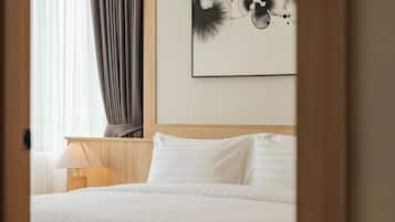 Suite Signature, 2 chambres | Coffre-fort, accès au Wi-Fi (inclus)