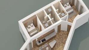 En 3D-modell av ett hotellrum med en säng, en sittgrupp och ett badrum.