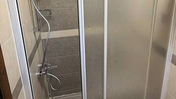 Standard Double Room | Bathroom | Shower, towels, soap, toilet paper