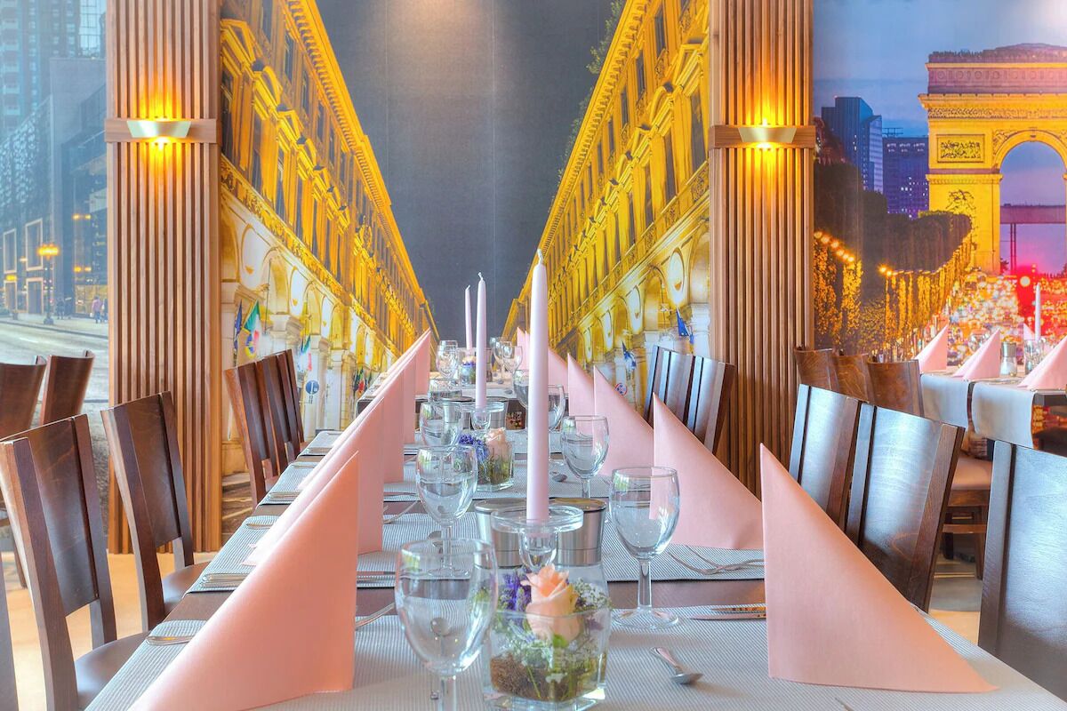 Dine beside striking wall art that sparks conversation and charm.