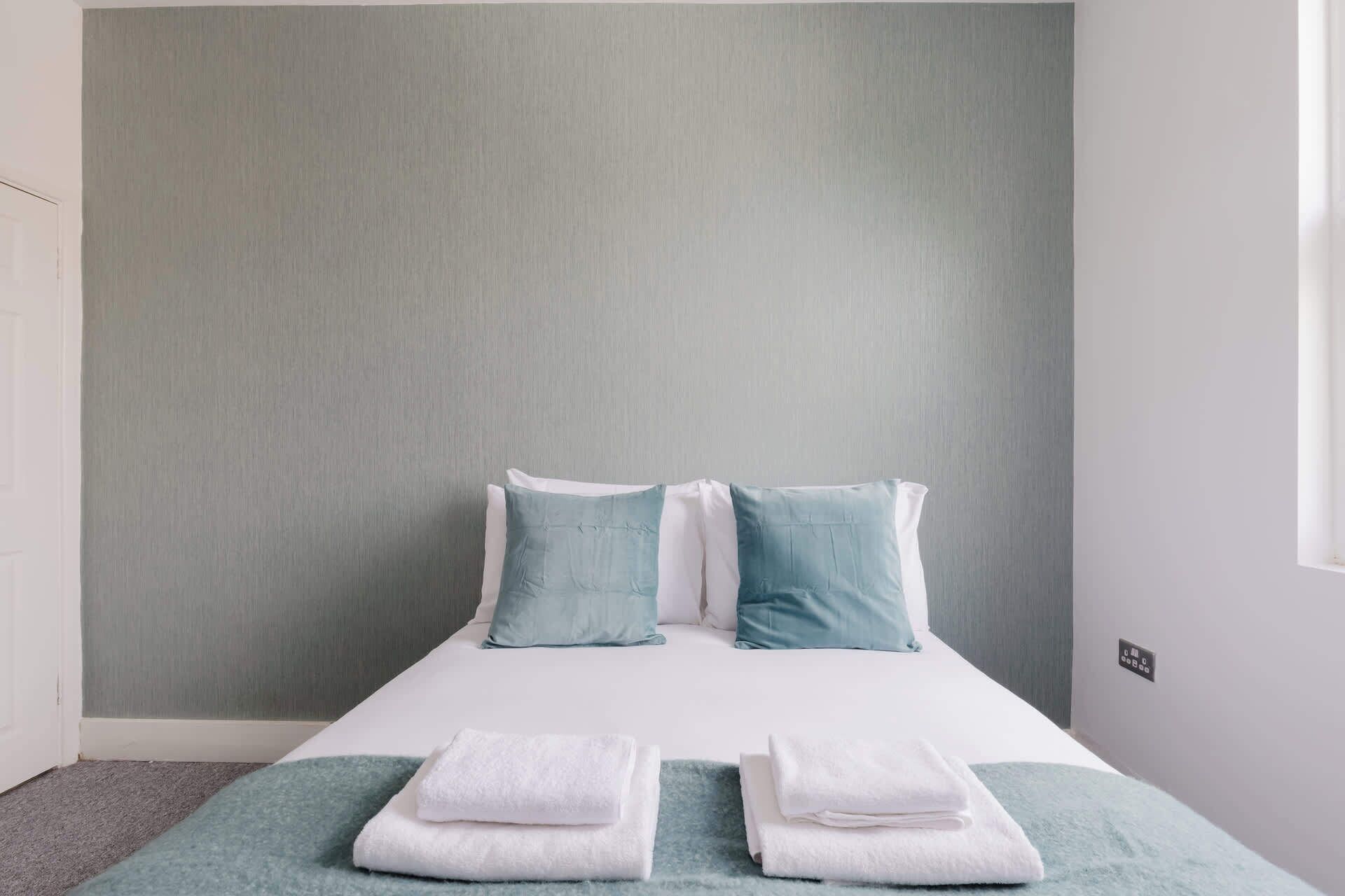 4 bedrooms, iron/ironing board, travel crib, internet