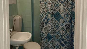 Shower, towels, soap, shampoo