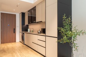 Deluxe Apartment, 1 Bedroom, City View | Private kitchen - The Kingston Opera - Metropole Residence (An Khanh)