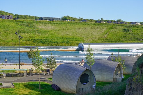 Luxury Pod With Wave Pool Views & Smart Features