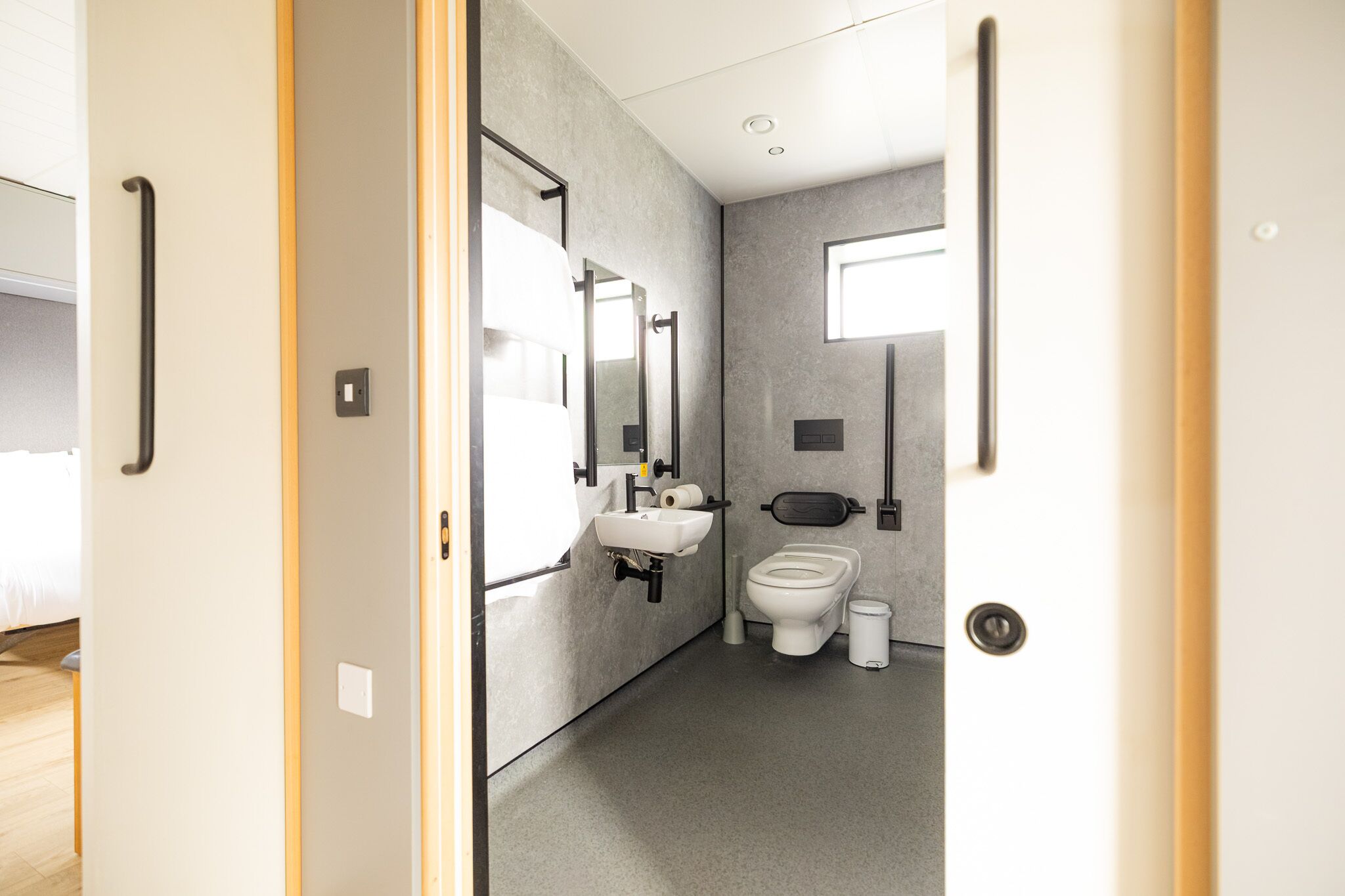 Shower, hair dryer, towels, shampoo