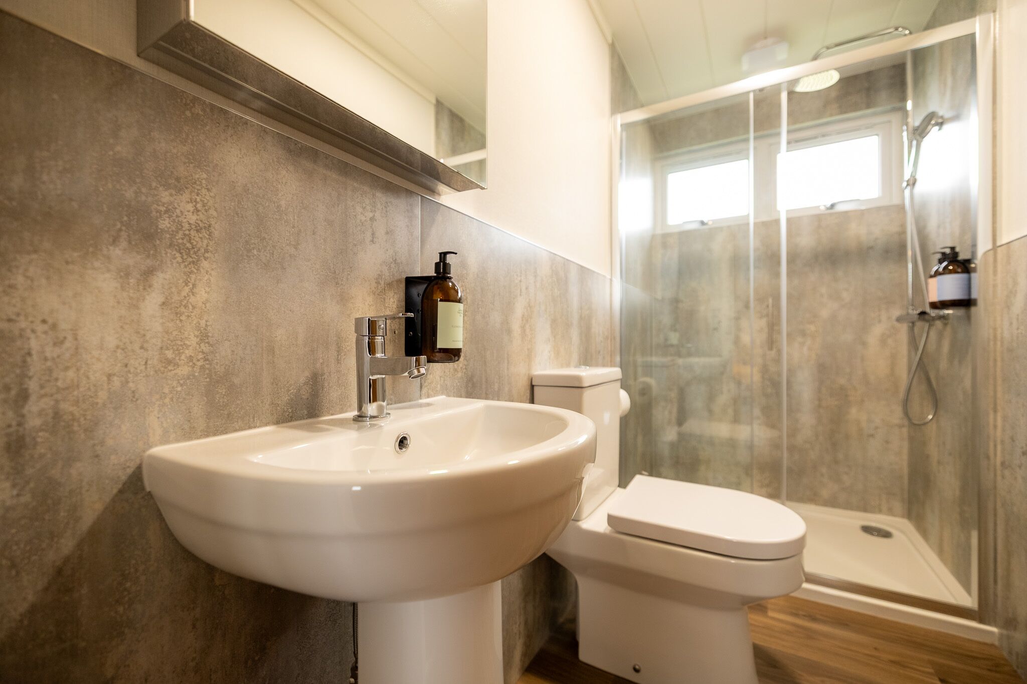 Shower, hair dryer, towels, shampoo