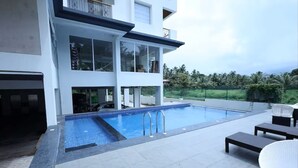 Luxury Double Room, City View | Pool | Outdoor pool - Calangute Heights (Calangute)