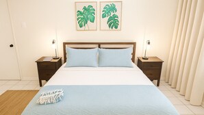 Een slaapkamer met een bed, twee nachtkastjes, een lamp, een raam met gordijnen en twee plantenfoto's in een lijst aan de muur.