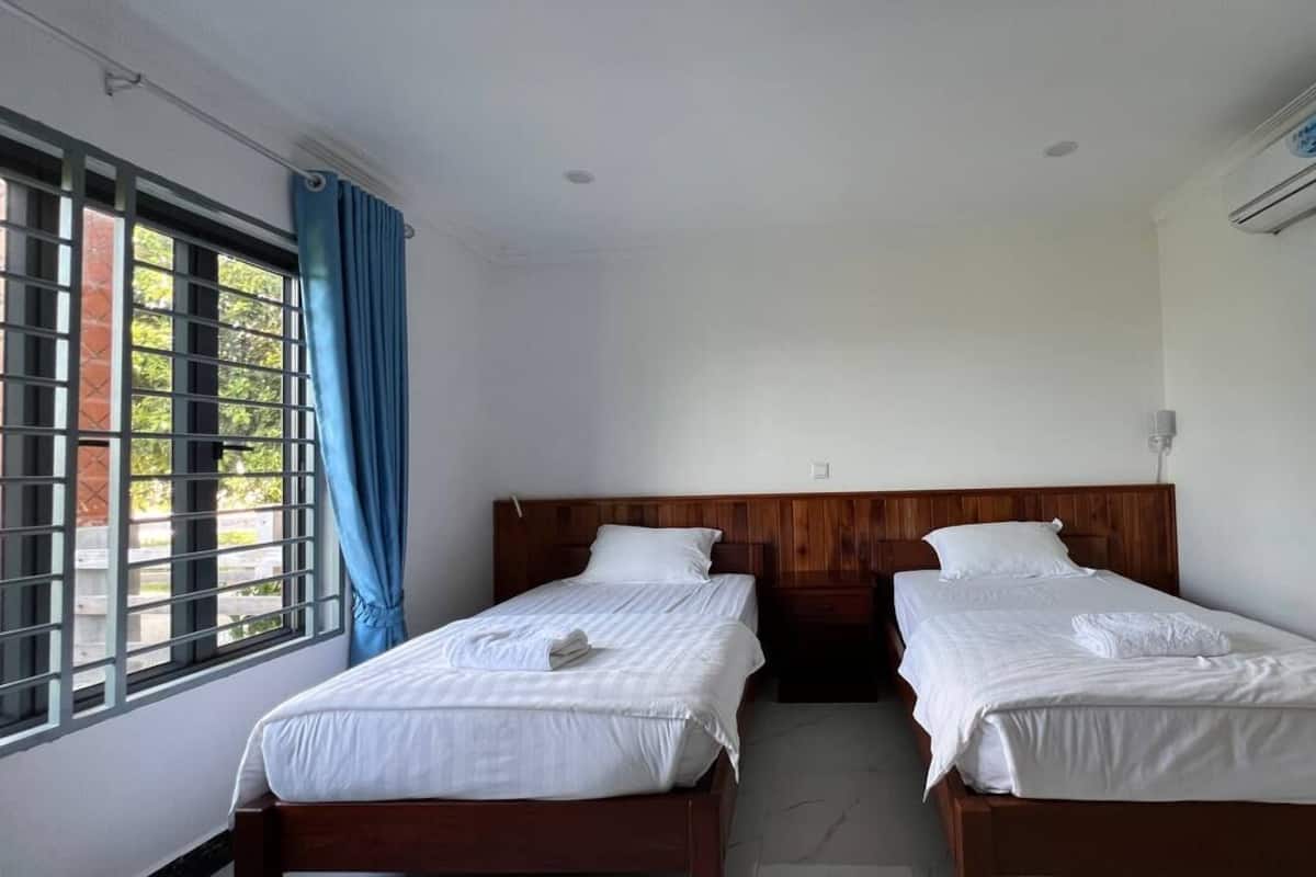 Habitación superior con 2 camas individuales | Escritorio y wifi gratis