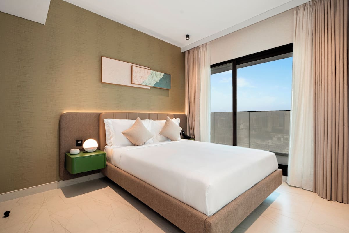 Apartamento executivo, 2 quartos, vista para a cidade | Ferros/tábuas de passar roupa, Wi-Fi de cortesia