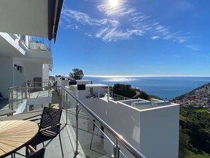 A modern balcony with a clear view of the sea and a coastal town. - Balcon del Mar Seaview 211 by Casasol (Nerja)