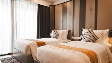 Chambre Deluxe Double ou avec lits jumeaux, patio, vue cour intérieure | Coffres-forts dans les chambres, chambres insonorisées, Wi-Fi gratuit