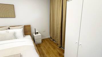 Ein Schlafzimmer mit Bett, Nachttisch, Kleiderschrank und einem Bild an der Wand.