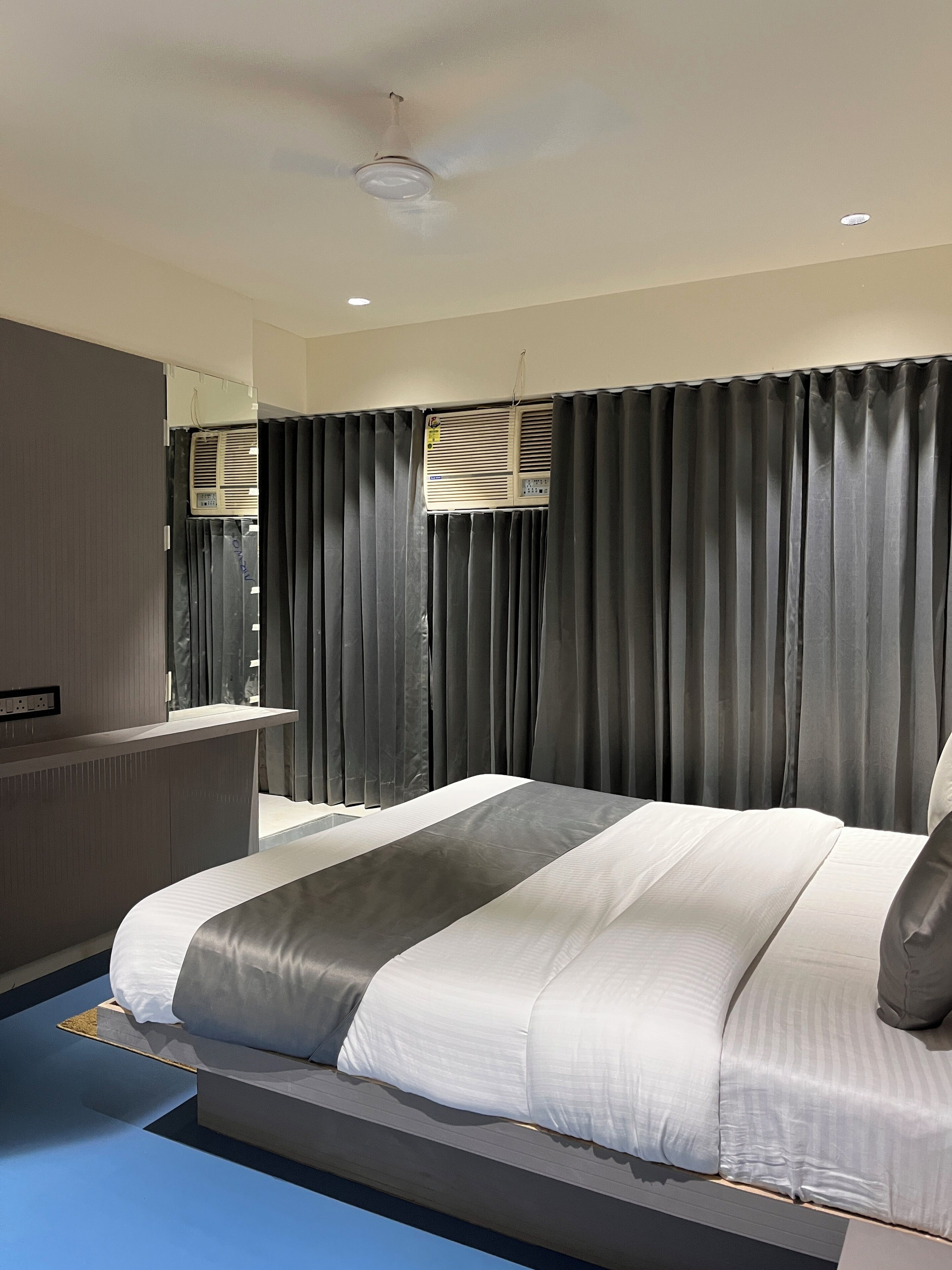 Deluxe Double Room, City View | In-room safe, desk, laptop workspace, iron/ironing board