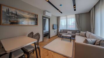 Superior Suite, Balcony | In-room safe, laptop workspace, iron/ironing board, free WiFi