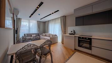 Superior Suite, Balcony | In-room safe, laptop workspace, iron/ironing board, free WiFi