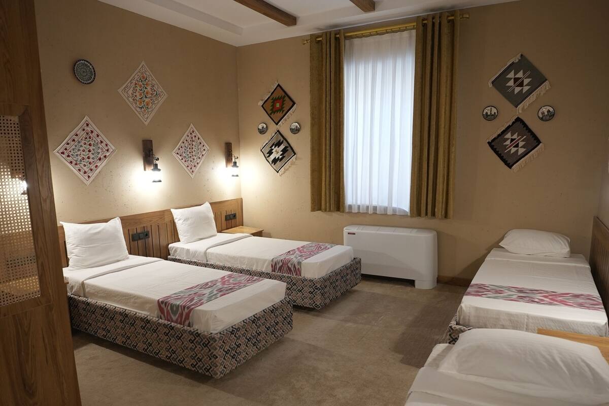 Habitación cuádruple estándar | Ropa de cama