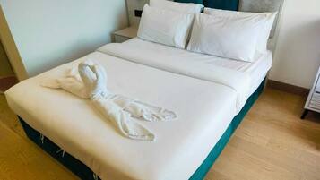 Premium bedding, pillow-top beds, in-room safe, soundproofing