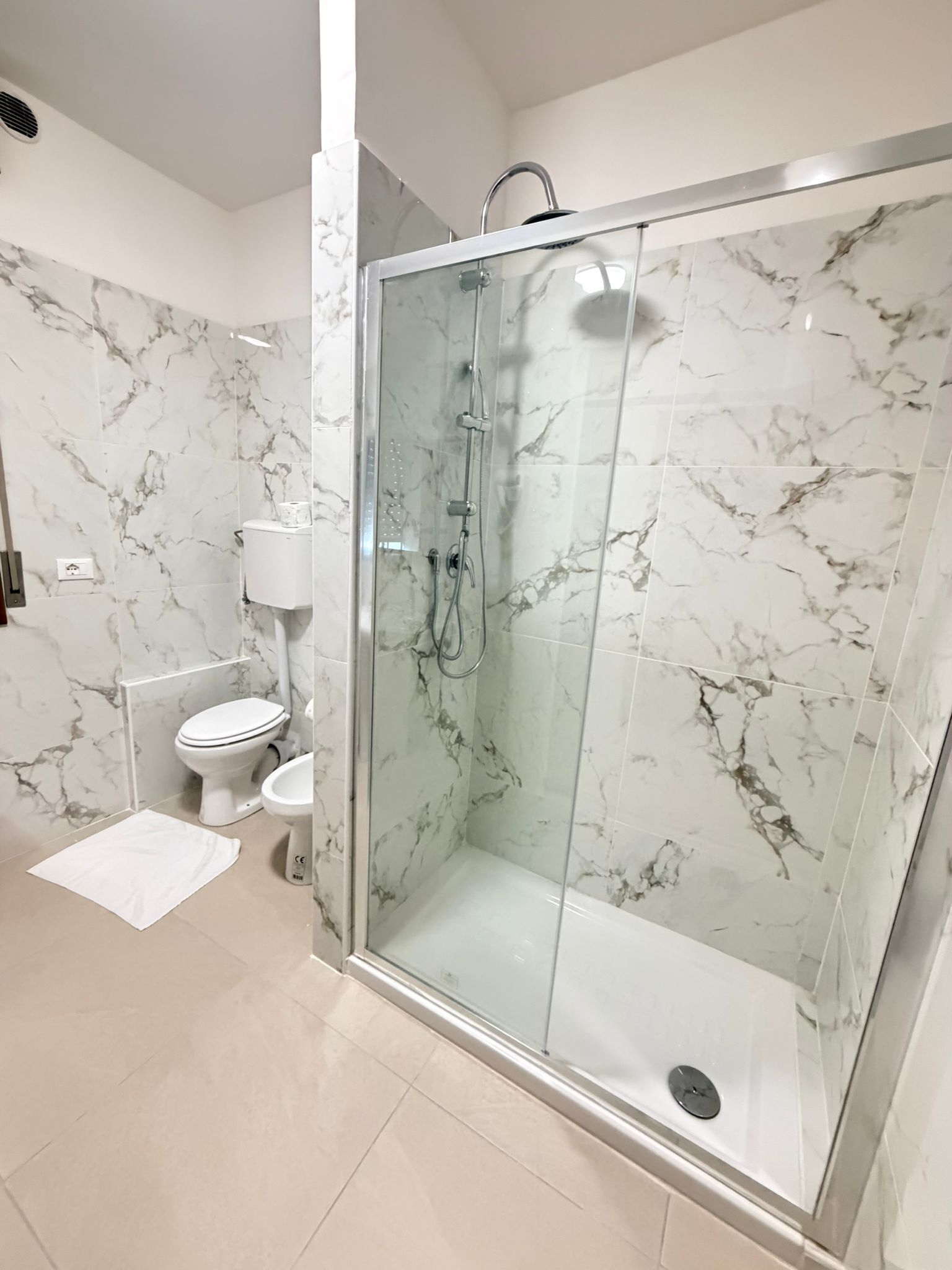Shower, free toiletries, hair dryer, towels