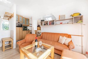 TV, DVD-spiller, bøker og musikkbibliotek