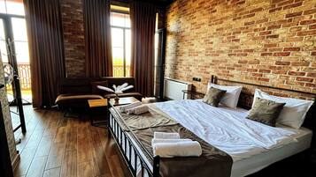 Deluxe Studio, Balcony, City View | Hypo-allergenic bedding available, memory foam beds