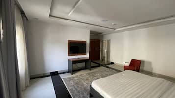 Family Room, Balcony, City View | In-room safe, desk, laptop workspace, blackout drapes
