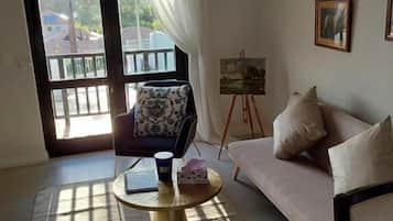 Apartment, 1 Schlafzimmer, Balkon, Stadtblick | Wohnzimmer
