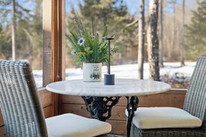 Outdoor dining - Pleasant View Luxury Off-Grid Estate with Hot Tub, Gym & Direct ATV Access (Island Falls)