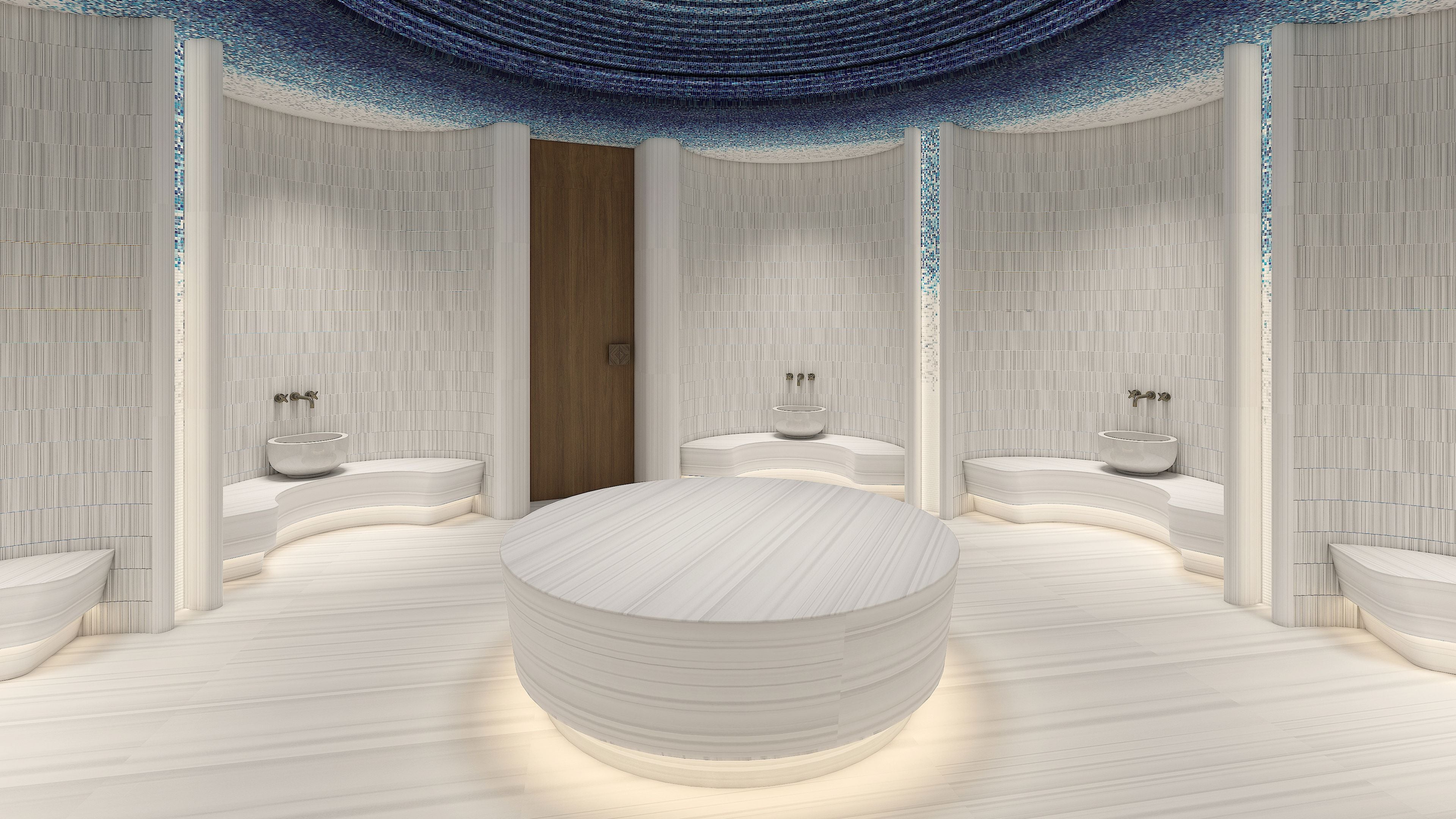 Un baño moderno con una bañera redonda central, dos lavamanos y una puerta de madera.