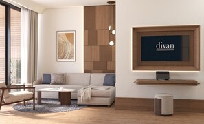 Doppia Deluxe, balcone, vista mare | Area soggiorno
