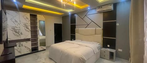Economy Apartment, Balcony, City View | In-room safe, desk, laptop workspace, blackout drapes