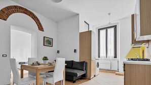 A modern kitchen with a built-in oven and a sink. - BLI39 Cozy apartment in the Bocconi area (Milano)