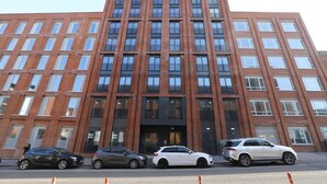 A multi-story building with a brick facade, large windows, and a central entrance. - Birmingham City Retreat No 151 (Birmingham)