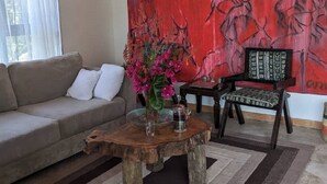 Standard Apartment | Living area - Giraffe Gallery Home-Josmac Tours & Arts (Arusha)