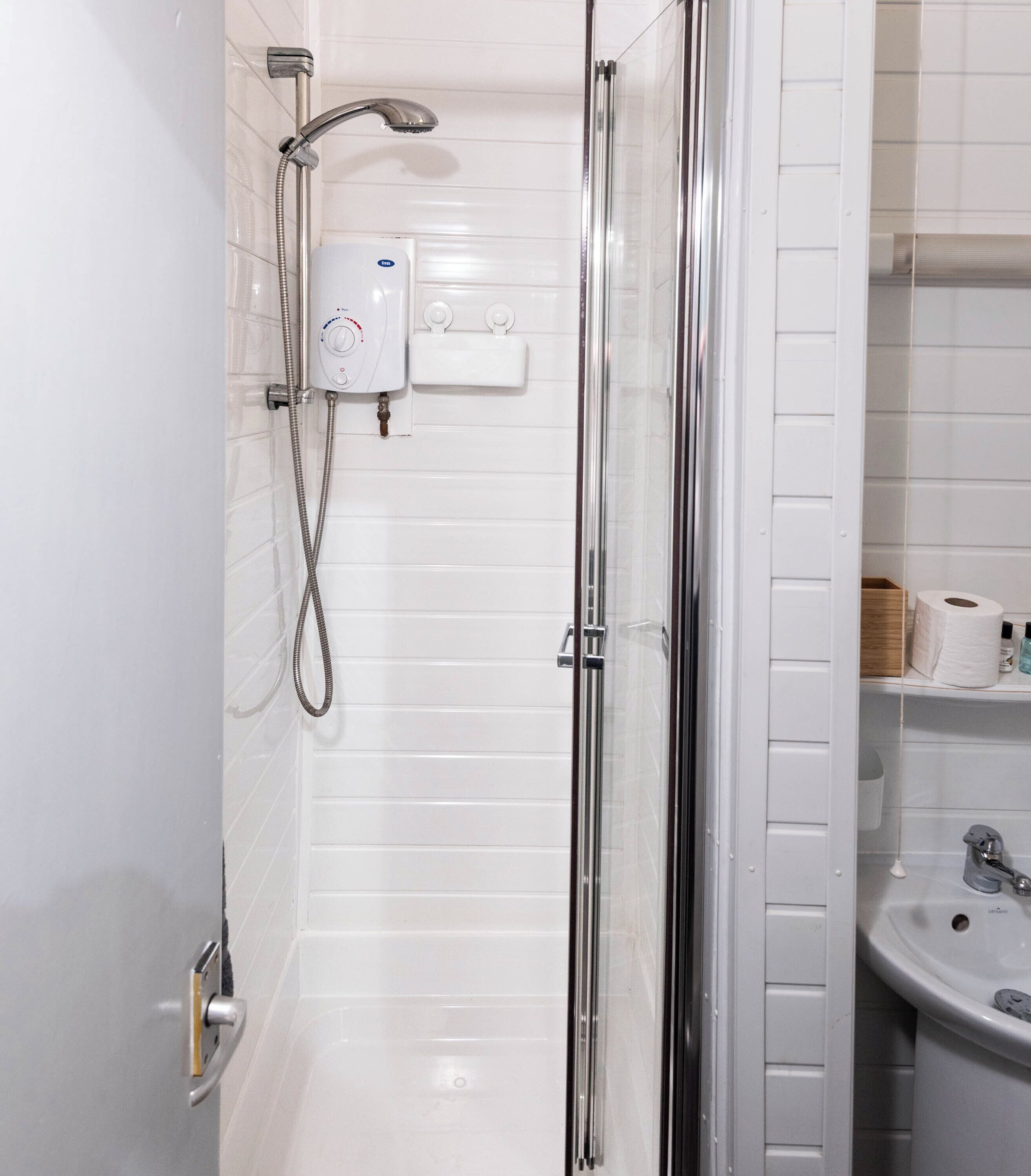 Shower, towels, toilet paper