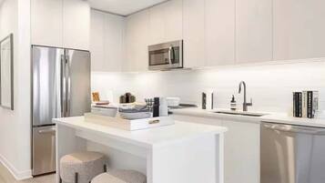 Coffee/tea maker, fridge, microwave, oven