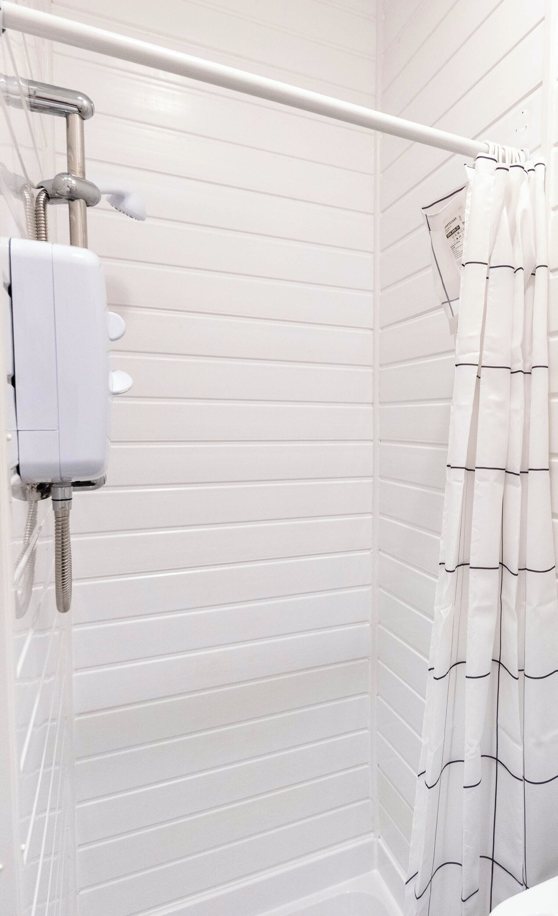 Shower, towels, toilet paper