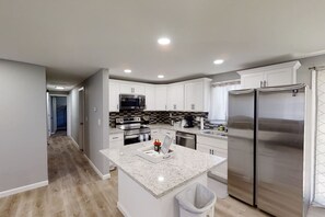 Coffee/tea maker, fridge, microwave, oven