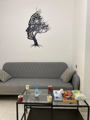 Habitación doble de lujo | Área de sala de estar