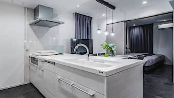 Luxury Apartment | Bathroom | Separate tub and shower, free toiletries, hair dryer, slippers