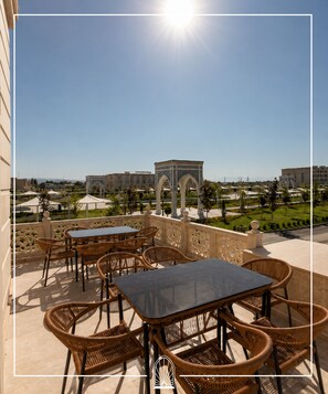 Outdoor dining - Imam Al-Bukhari Guest House (Khoja Ismail)