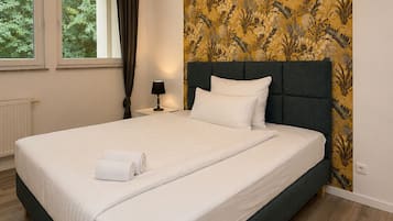 Family Apartment, Balcony, Courtyard View | Blackout drapes, soundproofing, iron/ironing board, WiFi (free)