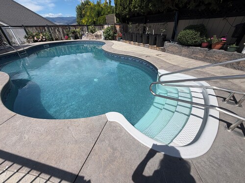 Poolside Oasis in Penticton | Private Fenced Pool, 3BR Family Retreat